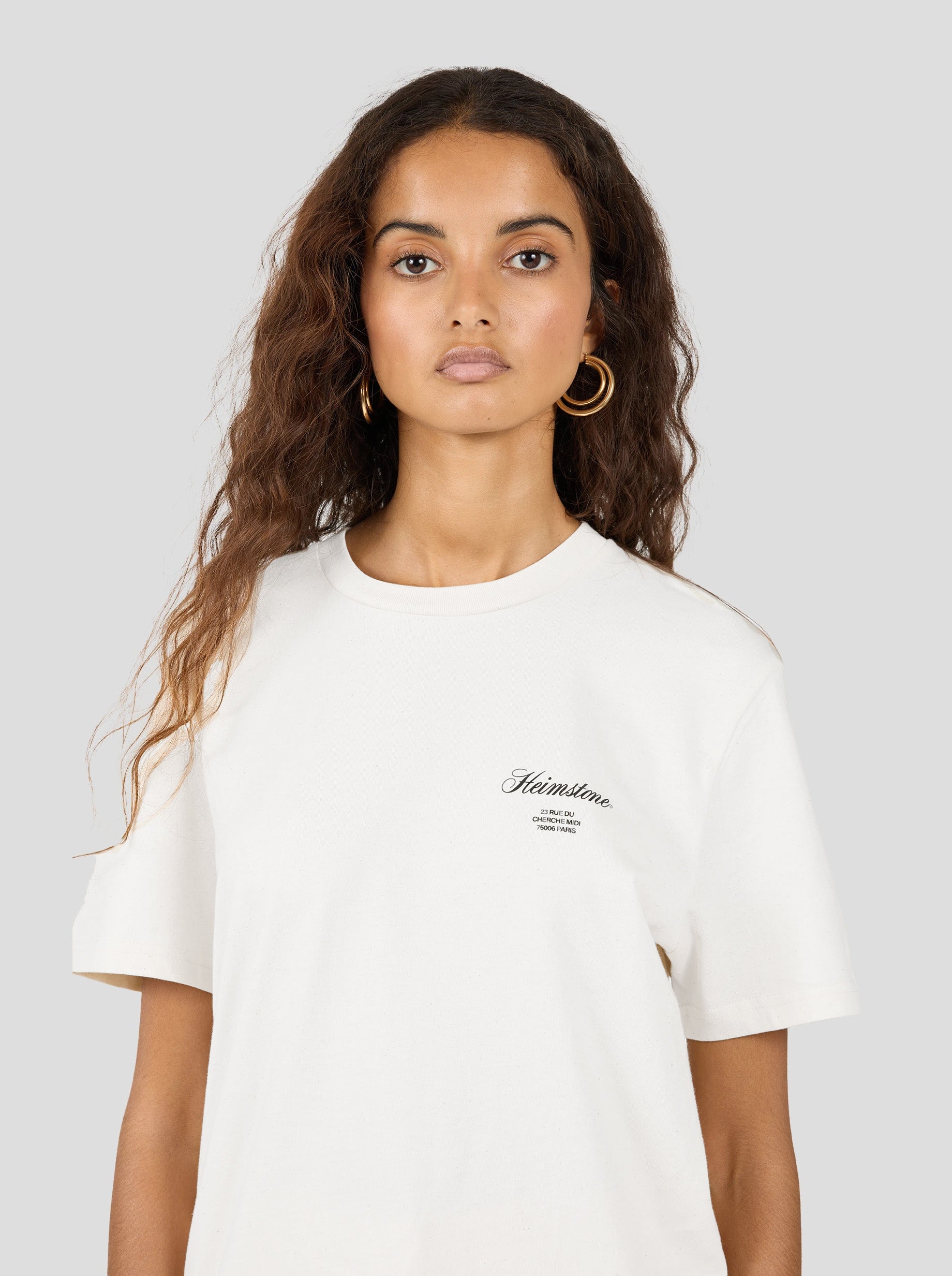 Collectible Unisex T-Shirt in White with White Heimstone Logo