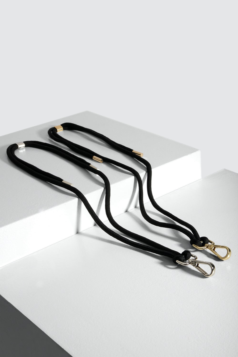 Gold and black phone strap